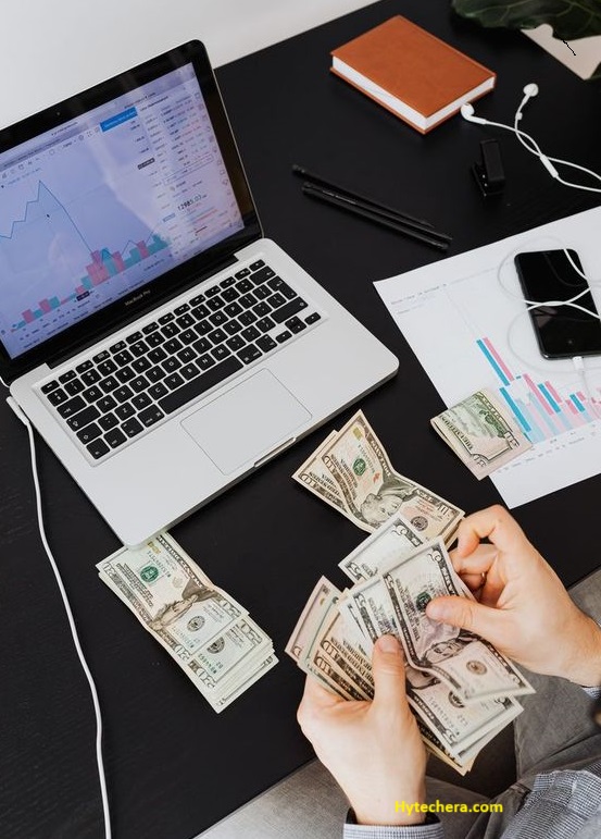 affiliate marketing A laptop screen displaying affiliate marketing analytics with dollar signs, representing online earnings through affiliate programs.