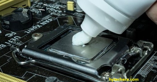 thermal paste Thermal paste applied to a laptop's processor for better heat dissipation and cooling efficiency